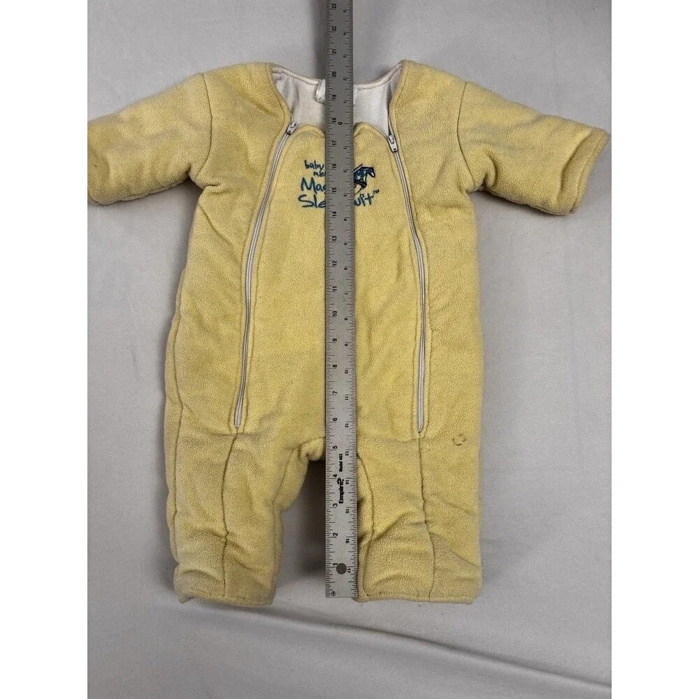 Baby Merlin’S Magic Sleepsuit soft yellow